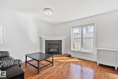 10813 66 Avenue, Edmonton, AB - Indoor Photo Showing Living Room With Fireplace
