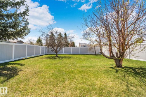 Expansive private yard featuring a full perimeter fence - 18903 70 Avenue, Edmonton, AB - Outdoor