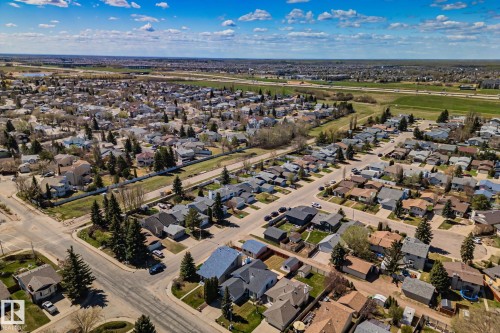 Residential neighborhood featuring paved streets and established homes - 18903 70 Avenue, Edmonton, AB - Outdoor With View