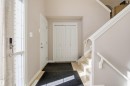 Bright entryway featuring light wood-finish flooring - 16204 48 Street, Edmonton, AB  - Indoor Photo Showing Other Room 