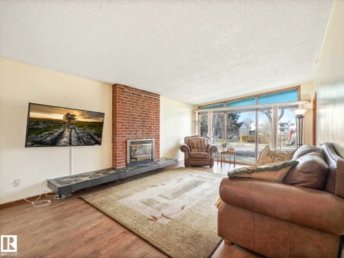 9735 155 Street, Edmonton, AB - Indoor Photo Showing Living Room With Fireplace
