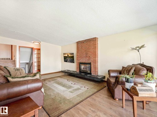 9735 155 Street, Edmonton, AB - Indoor Photo Showing Living Room With Fireplace