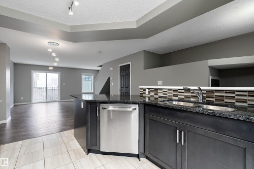 90 3305 Orchards Link Link, Edmonton, AB - Indoor Photo Showing Kitchen With Double Sink