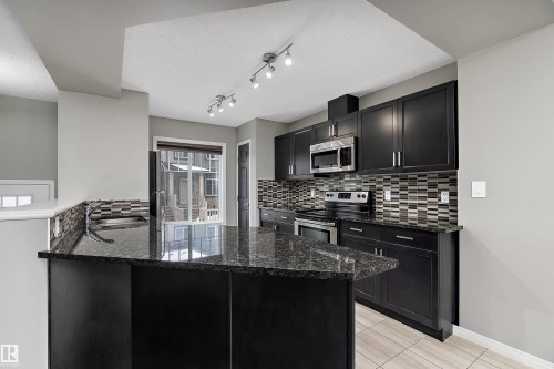 90 3305 Orchards Link Link, Edmonton, AB - Indoor Photo Showing Kitchen With Upgraded Kitchen
