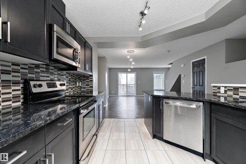 90 3305 Orchards Link Link, Edmonton, AB - Indoor Photo Showing Kitchen With Stainless Steel Kitchen With Upgraded Kitchen