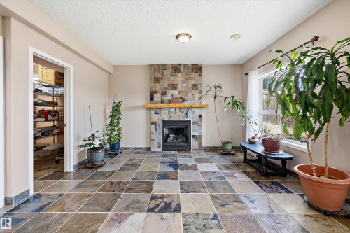 130 Foxhaven Way, Sherwood Park, AB - Indoor Photo Showing Living Room With Fireplace