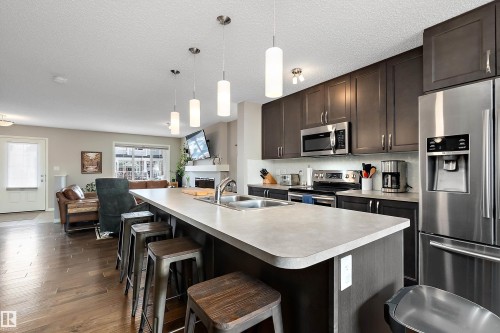 8324 23 Avenue, Edmonton, AB - Indoor Photo Showing Kitchen With Double Sink With Upgraded Kitchen