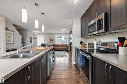 8324 23 Avenue, Edmonton, AB - Indoor Photo Showing Kitchen With Double Sink