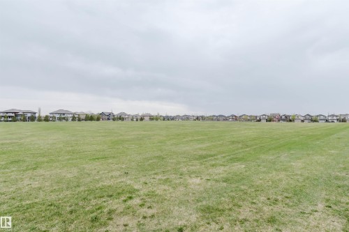 Expansive green space featuring a large grassy field - 17718 5A Avenue, Edmonton, AB - Outdoor With View