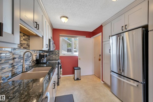14261 30 Street, Edmonton, AB - Indoor Photo Showing Kitchen With Stainless Steel Kitchen With Double Sink With Upgraded Kitchen