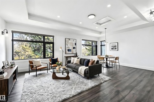 Virtually staged to demonstrate options for the space - 8723 138 Street, Edmonton, AB - Indoor Photo Showing Living Room