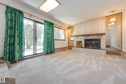 12307 54 Street, Edmonton, AB - Indoor Photo Showing Living Room With Fireplace