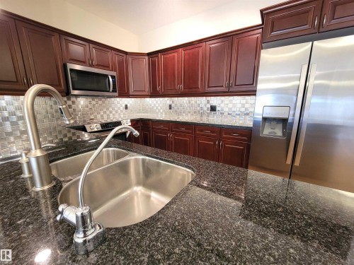 442 160 Magrath Road, Edmonton, AB - Indoor Photo Showing Kitchen With Stainless Steel Kitchen With Double Sink With Upgraded Kitchen