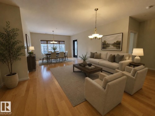 Staged image showcasing potential furnishing ideas for the living room - 442 160 Magrath Road, Edmonton, AB - Indoor Photo Showing Living Room