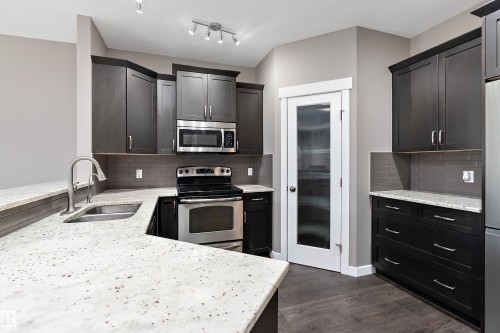 5 Gilmore Way, Spruce Grove, AB - Indoor Photo Showing Kitchen With Stainless Steel Kitchen With Double Sink With Upgraded Kitchen