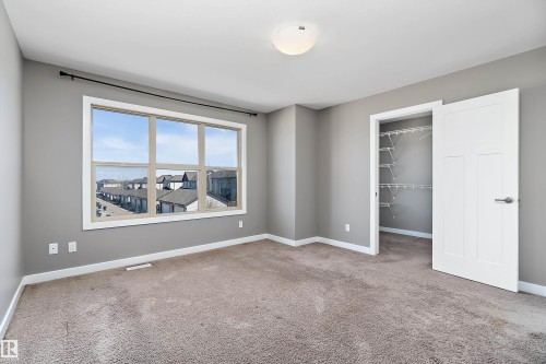 5 Gilmore Way, Spruce Grove, AB - Indoor Photo Showing Other Room