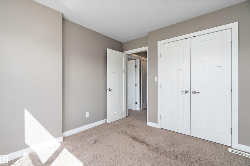 5 Gilmore Way, Spruce Grove, AB - Indoor Photo Showing Other Room