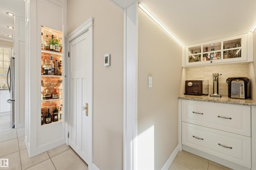 Homage to the original features of thsi gorgeous home - 10813 74 Avenue, Edmonton, AB - Indoor Photo Showing Other Room