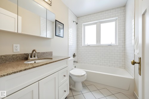 Thie photo is a virtual rendering of an aprox view of the completed bathroom. Bathroom is in the process of tiling - 10813 74 Avenue, Edmonton, AB - Indoor Photo Showing Bathroom