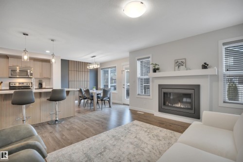194 Sturtz Bend, Leduc, AB - Indoor Photo Showing Living Room With Fireplace