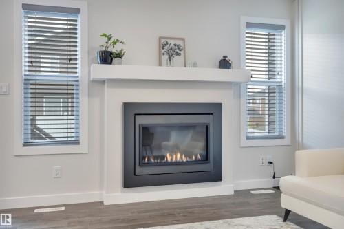 194 Sturtz Bend, Leduc, AB - Indoor Photo Showing Living Room With Fireplace