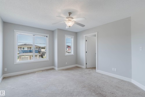 Carpeted interior room with light grey wall paint - 2839 Koshal Crescent, Edmonton, AB - Indoor Photo Showing Other Room