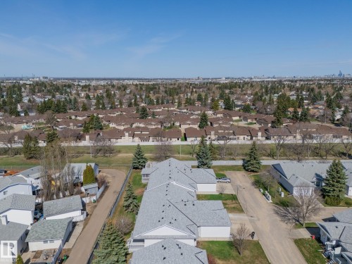 Aerial perspective showcasing a residential area with varied housing styles - 25 1904 Mill Woods Road Road, Edmonton, AB - Outdoor With View