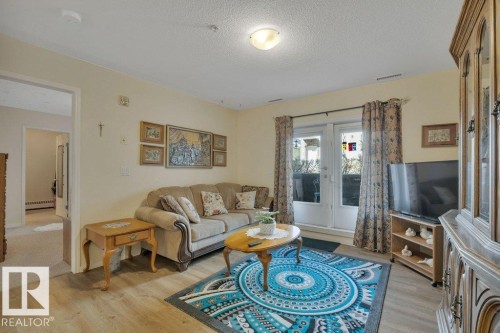 108 4806 48 Avenue, Leduc, AB - Indoor Photo Showing Living Room