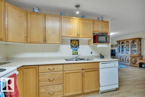 108 4806 48 Avenue, Leduc, AB - Indoor Photo Showing Kitchen With Double Sink