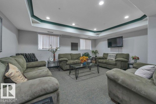 108 4806 48 Avenue, Leduc, AB - Indoor Photo Showing Living Room
