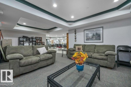 108 4806 48 Avenue, Leduc, AB - Indoor Photo Showing Living Room