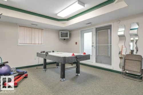 108 4806 48 Avenue, Leduc, AB - Indoor Photo Showing Other Room