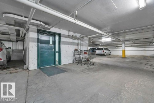 108 4806 48 Avenue, Leduc, AB - Indoor Photo Showing Garage
