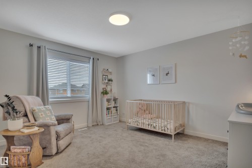 258 Robinson Drive, Leduc, AB - Indoor Photo Showing Bedroom