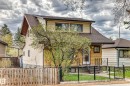 Two-story residence featuring a combination of horizontal siding and brick veneer - 11929 91 Street, Edmonton, AB 
