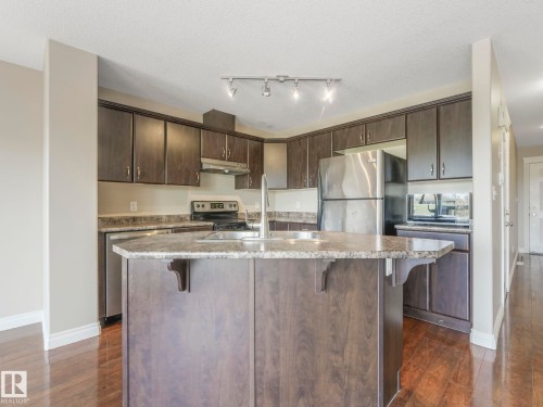 86 Meridian Loop Nw, Stony Plain, AB - Indoor Photo Showing Kitchen With Double Sink
