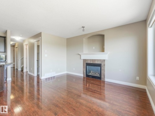 86 Meridian Loop Nw, Stony Plain, AB - Indoor Photo Showing Living Room With Fireplace