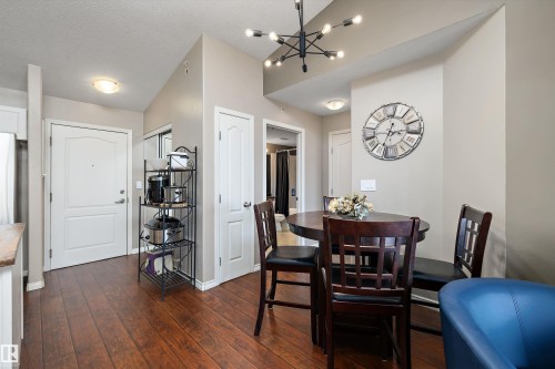 Dining area with a look at the linen closet as well as laundry area - 415 12550 140 Avenue, Edmonton, AB - Indoor Photo Showing Dining Room