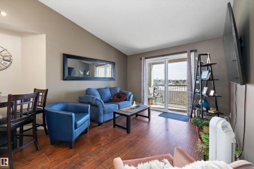 Bright living room with look on the south facing balcony - 415 12550 140 Avenue, Edmonton, AB - Indoor Photo Showing Living Room