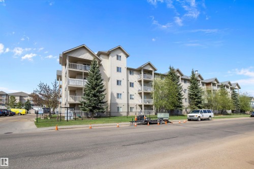 Street view of the apartment complex - 415 12550 140 Avenue, Edmonton, AB - Outdoor With Balcony With Facade
