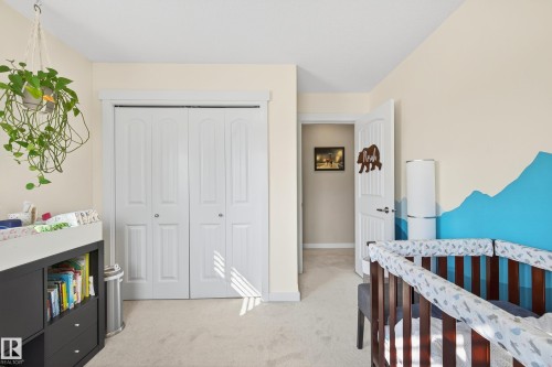 Light-colored wall paint throughout - 8003 Summerside Grande Boulevard, Edmonton, AB - Indoor Photo Showing Bedroom