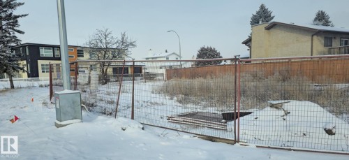 The property features an expansive, undeveloped lot - 6004 19A Avenue Nw, Edmonton, AB 