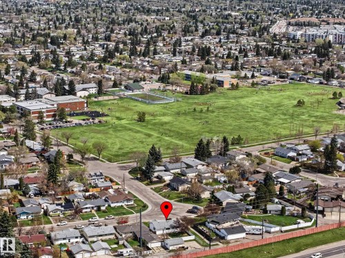 Residential neighborhood featuring mature trees and a substantial green space with athletic fields - 16715 79A Avenue, Edmonton, AB - Outdoor With View