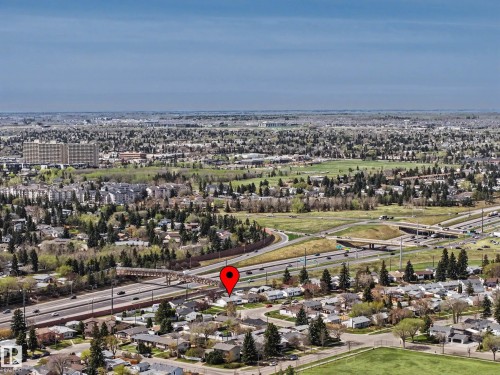 Aerial perspective showcasing a residential area with varied housing styles - 16715 79A Avenue, Edmonton, AB - Outdoor With View