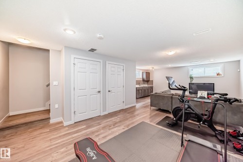 Finished lower level featuring wood-finish flooring, recessed lighting, and a neutral color palette - 6919 Cardinal Wynd, Edmonton, AB - Indoor Photo Showing Office