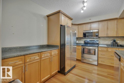 302 102A Bridgeport Crossing, Leduc, AB - Indoor Photo Showing Kitchen
