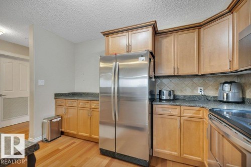 302 102A Bridgeport Crossing, Leduc, AB - Indoor Photo Showing Kitchen