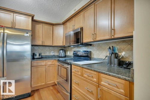302 102A Bridgeport Crossing, Leduc, AB - Indoor Photo Showing Kitchen