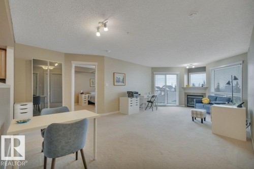 302 102A Bridgeport Crossing, Leduc, AB - Indoor With Fireplace