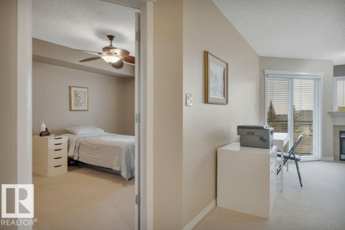 302 102A Bridgeport Crossing, Leduc, AB - Indoor Photo Showing Bedroom